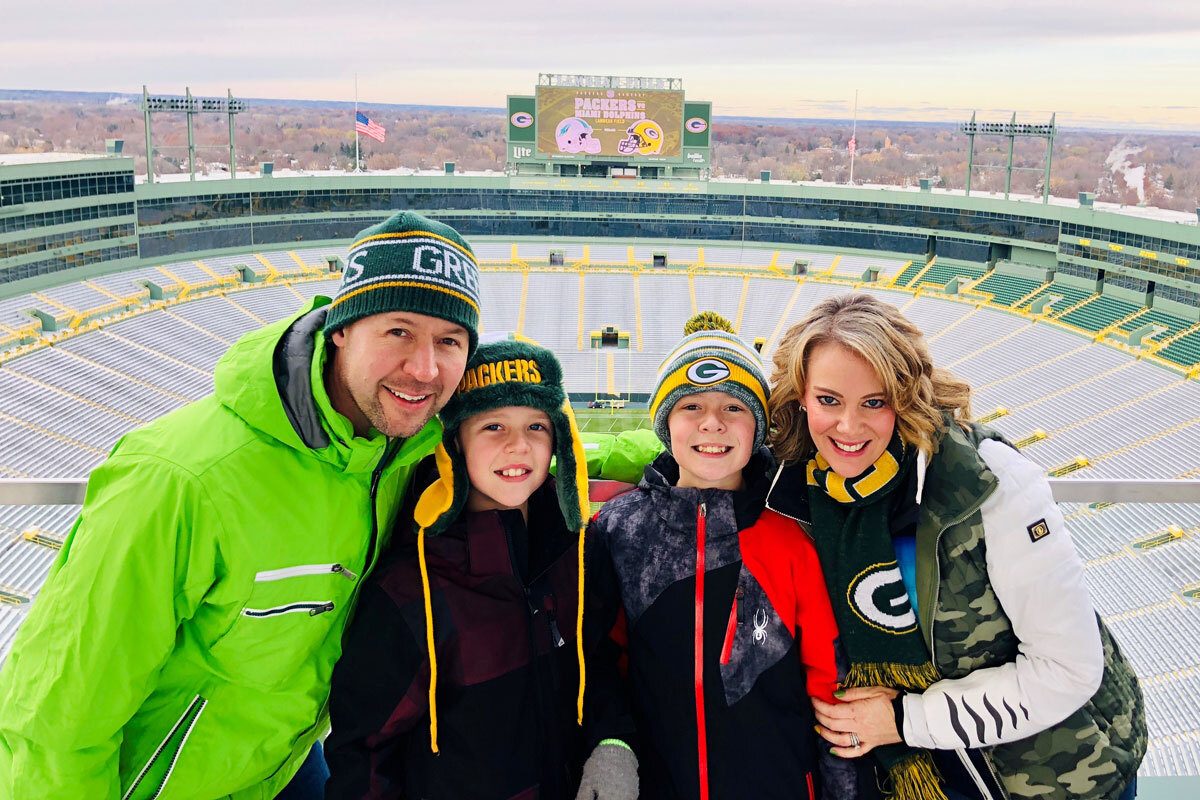 Brian McKnight with his family at Packers game