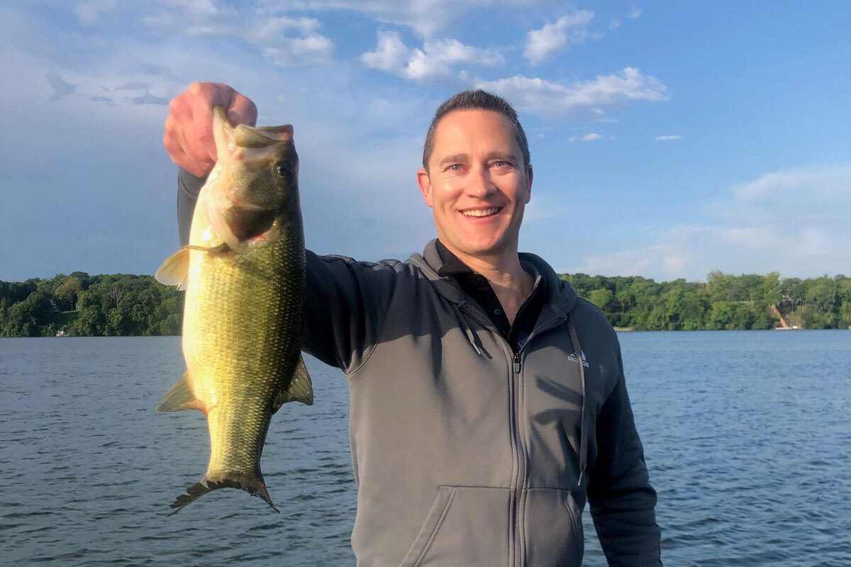 Chris Kellett holding a fish